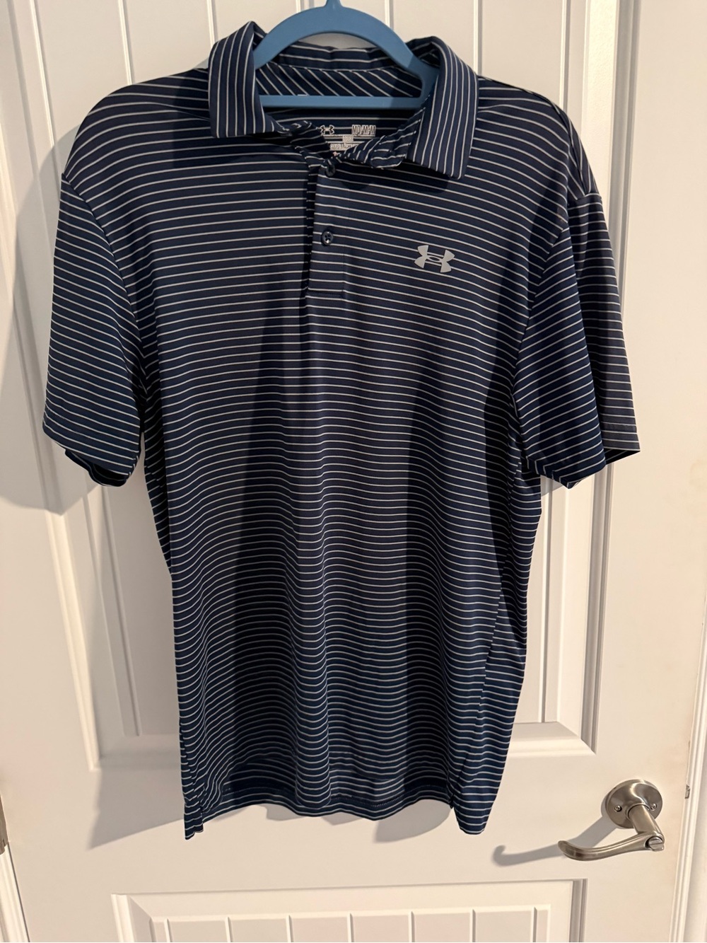 Under Armour heatgear loose Navy and White Striped Men’s Polo size medium